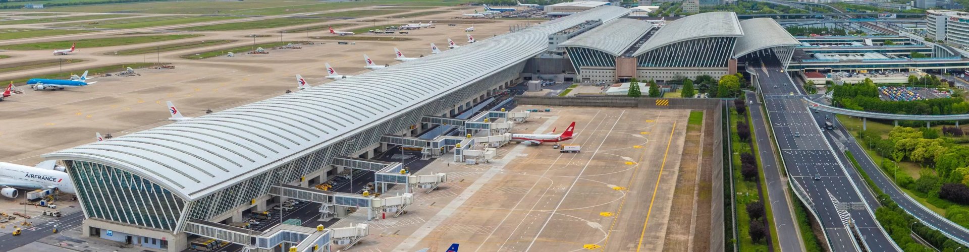 Shanghai Pudong Airport terminal bustling with travellers