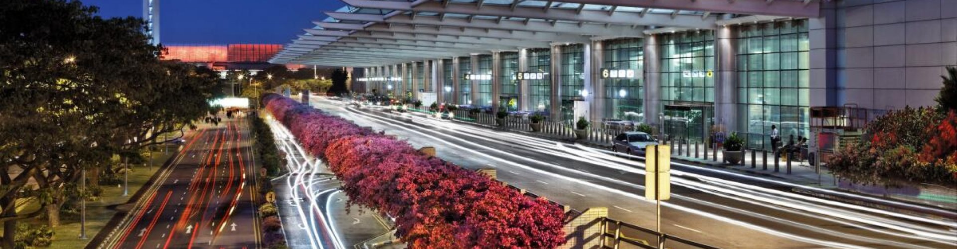 Sunrise over Changi Intl Airport terminals